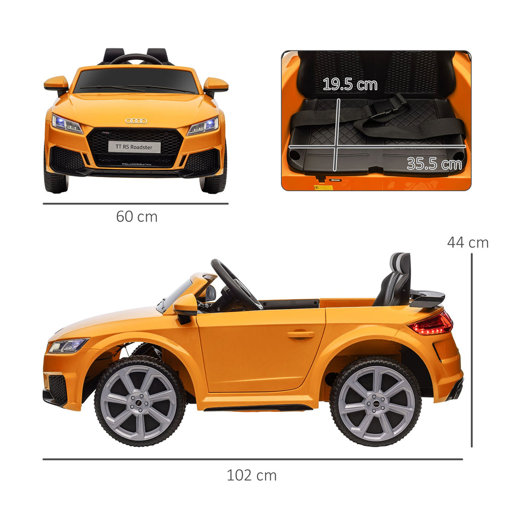 Carro infantil licenciado Audi TT RS com bateria de 12 V, suspensão com controle remoto, faróis e leitor de MP3, velocidade de 3 km/h, cor amarela